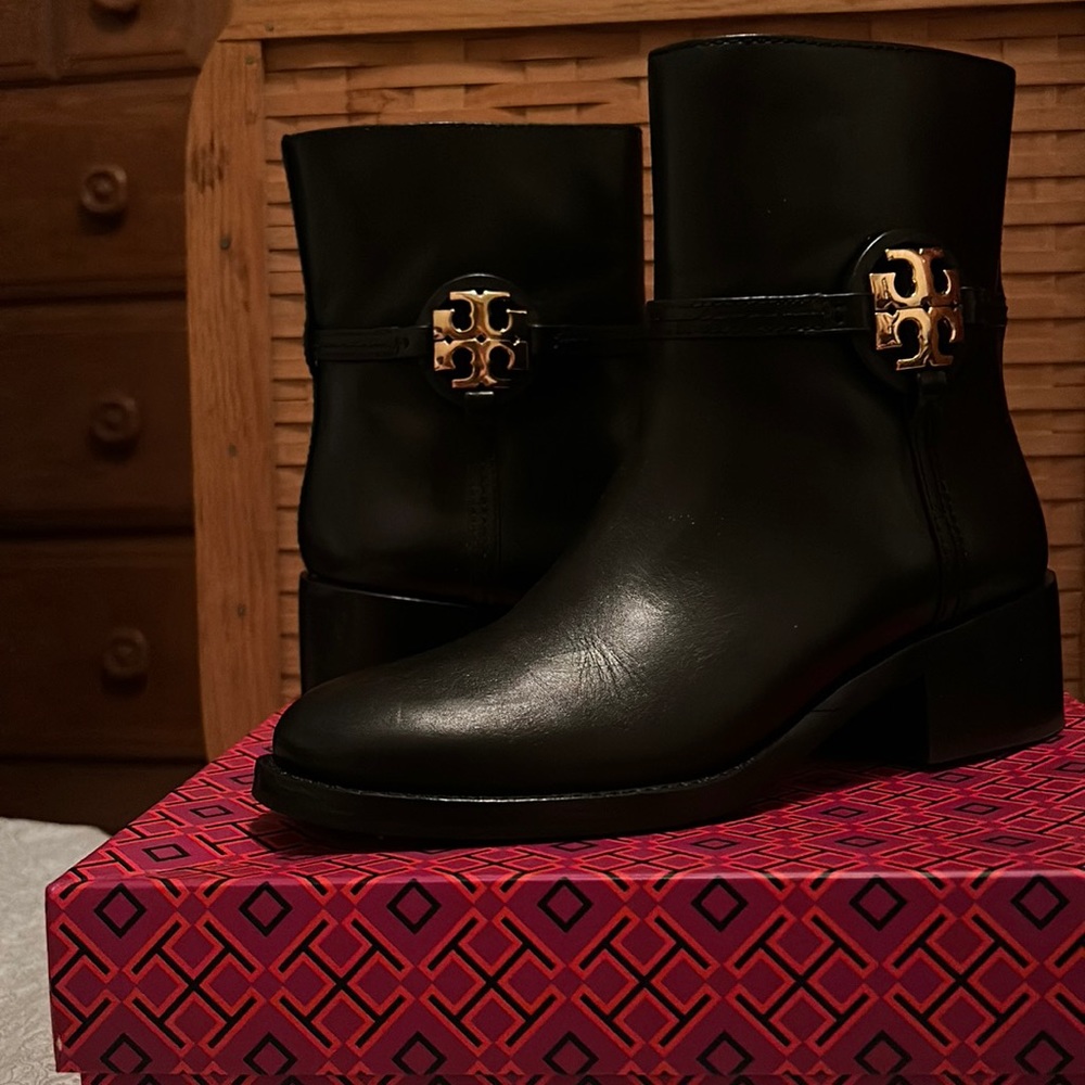 NIB- New Tory Burch black leather boots. Size 6.5. Never worn.